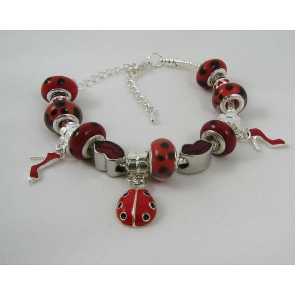 Bracciale in argento con perline rosse a forma di coccinella