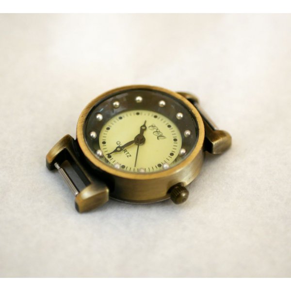 Quadrante dell'orologio a molla nero e bronzo