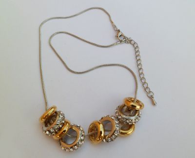 Collana con anelli in argento e oro