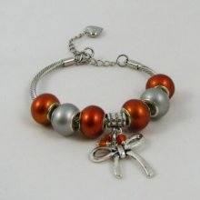 Bracciale in argento con perline arancioni e fiocco
